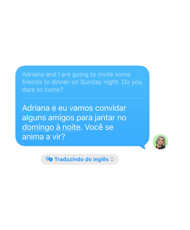 O recurso Tradução ao Vivo no Mensagens em uso, mostrando a tradução do inglês para o espanhol
