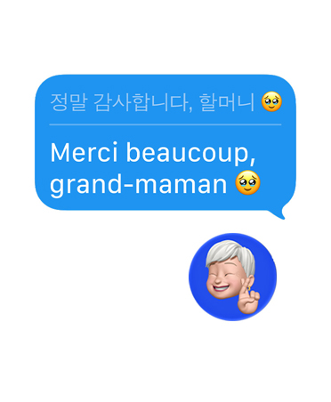 Traduction en direct dans Messages, où un texto de remerciement d’une utilisatrice à sa grand-mère est automatiquement traduit en coréen, avec un émoji de clin d’œil sous la bulle de texte