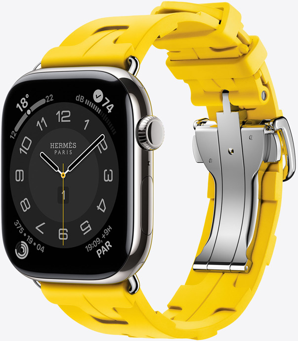 Vista en diagonal de un reloj con la esfera Hermès Circulaire y la correa Kilim color Sun (amarillo) que muestra el acabado de goma y la hebilla desplegable de metal.