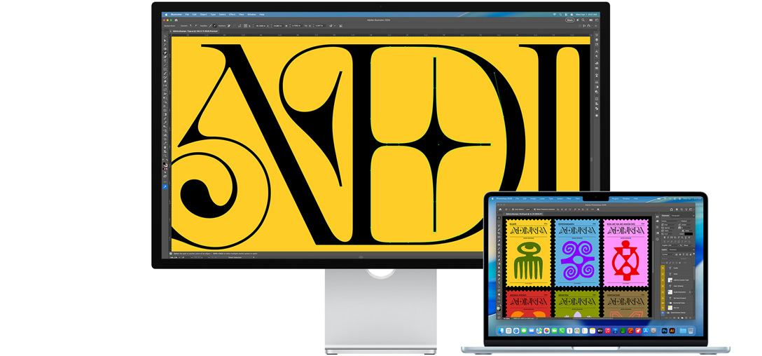Studio Display och en bärbar Mac där ett projekt är under arbete i flera olika Adobe-program, Studio Display visar en närbild av svart text mot en mättad gul bakgrund, antireflexbehandlingen hjälper till att minska blänk