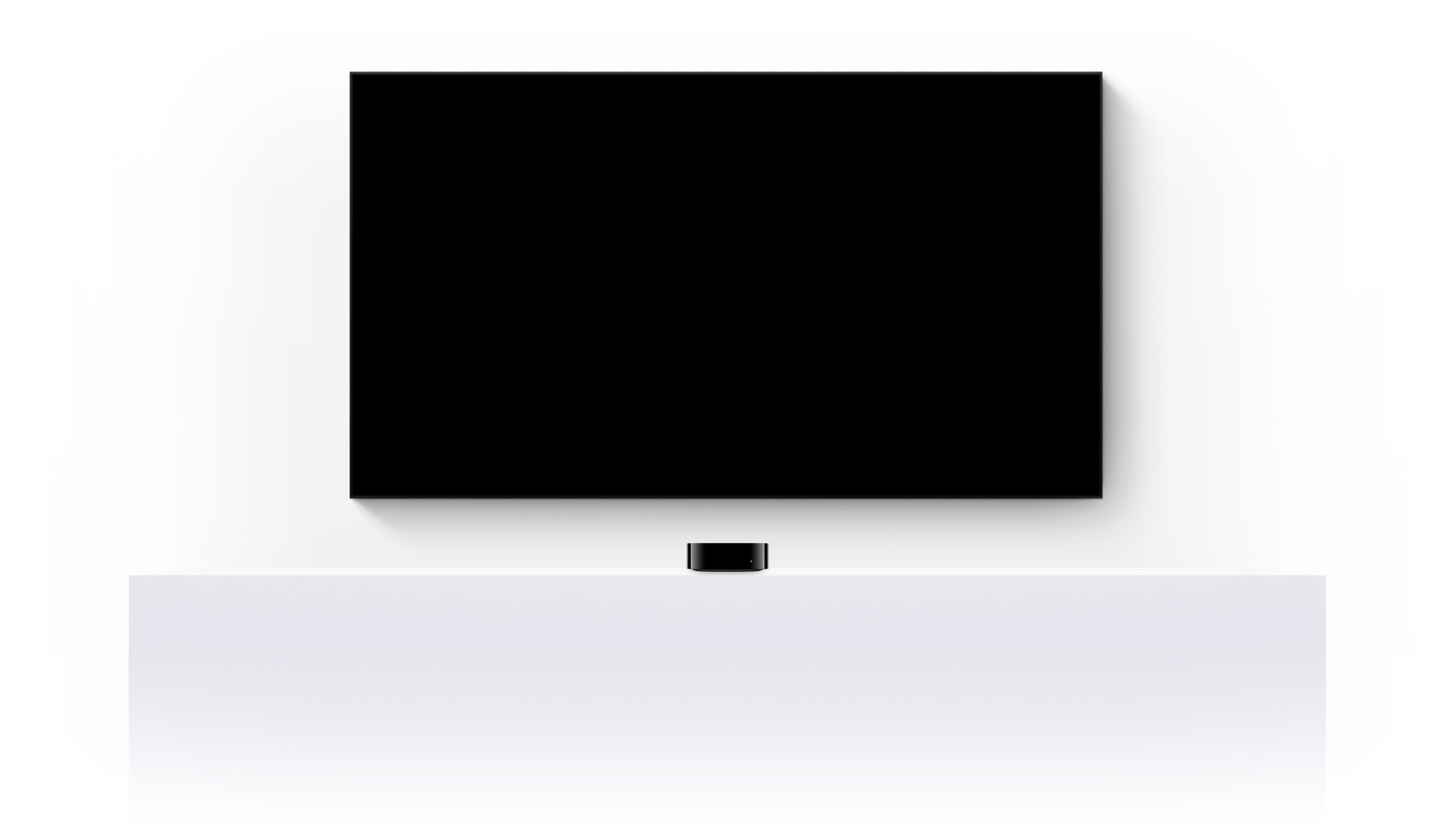 Egy Apple TV 4k, és egy síkképernyős tévé, amelyek különböző Apple TV+-filmek és -sorozatok rövidített előzetesét játsszák le.