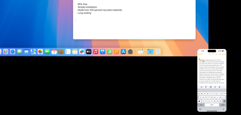 iPhone using the Universal Clipboard to copy notes to Mac mini M4 with Studio Display.