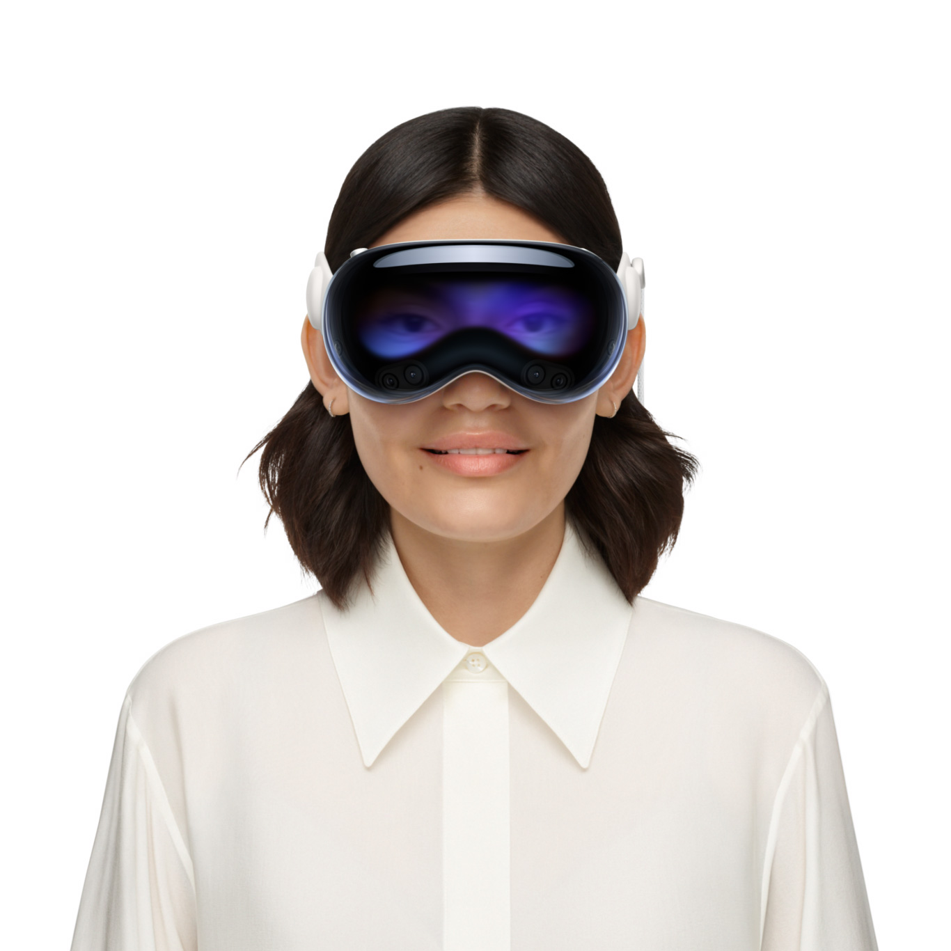 Apple Vision Pro를 착용한 사람의 모습. 외부 디스플레이를 통해 두 눈이 보입니다.