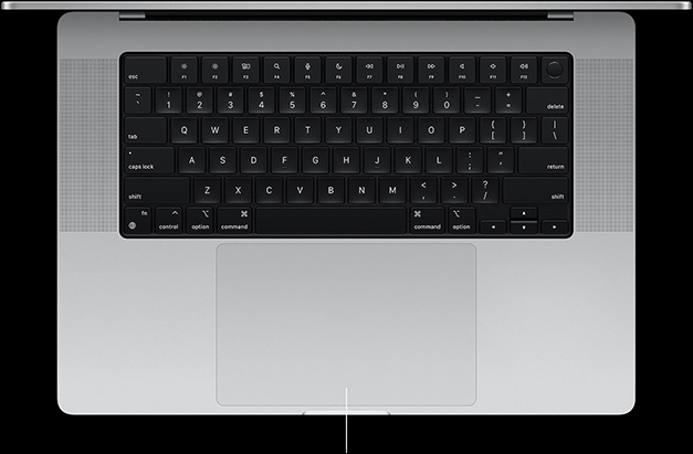 Top-down view of open MacBook Pro 16-inch showing Force Touch trackpad located below keyboard