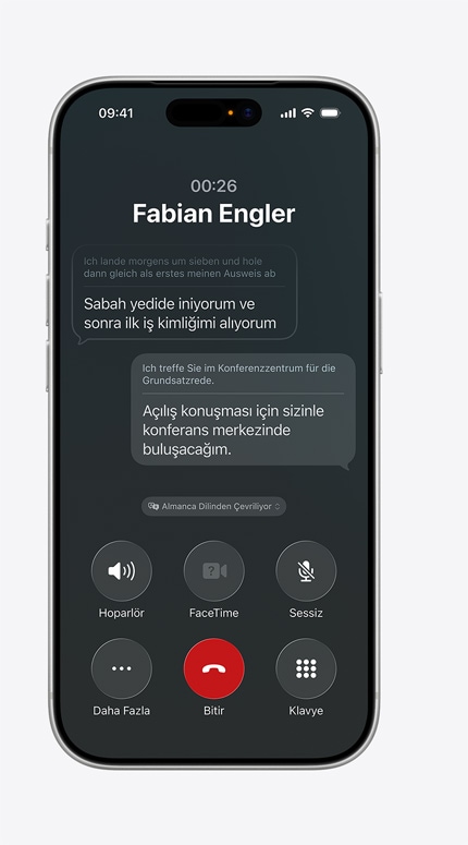 iPhone ekranında bir mesajın Canlı Çeviri ile Almancadan İngilizceye çevrildiği görünüyor