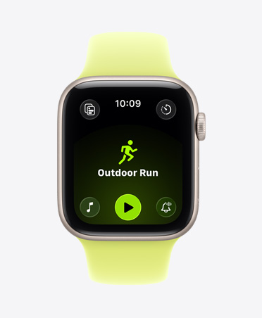Apple Watch SE 3, aluminium case, starlight colour, Outdoor Run workout open, Apple Music play controls at bottom of screen, Sport Band, neon yellow colour