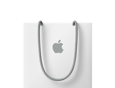 圖片展示白色 Apple 提袋，灰色提把，中央有灰色 Apple 標誌