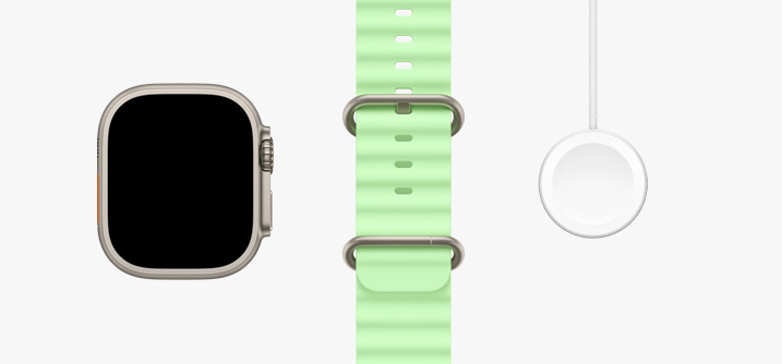 Apple Watch Ultra 3 原色鈦金屬錶殼，展示延伸至邊緣的顯示器；一旁是霓虹綠色海洋錶帶，以及 Apple Watch 磁性快速充電器對 USB-C 連接線