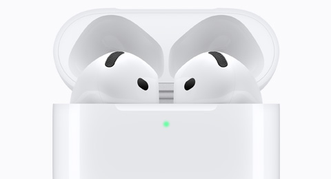AirPods 4 inside an open white charging case