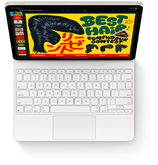 En iPad Air vist ovenfra med et hvidt Magic Keyboard til iPad Air.