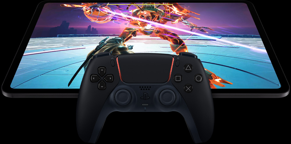 Wireless PlayStation controller atop iPad Pro, front exterior, landscape orientation, space black colour, display showing a video game screen of a futuristic robot mech with a glowing pink laser sword