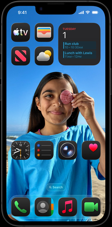 iPhone 16e surrounded by apps including Apple Mail, WhatsApp, Safari, Apple Maps, Apple Music, Photos, Notes, and Home.