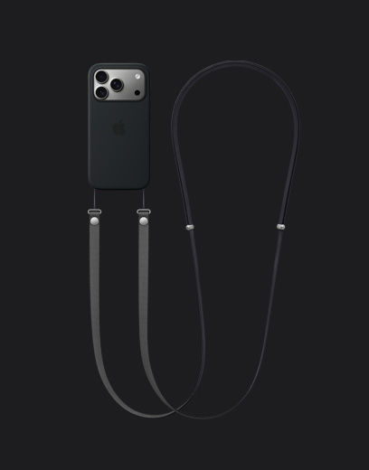 銀色 iPhone 17 Pro 機身背面，搭配黑色 MagSafe 矽膠保護殼並安裝深灰色斜背掛繩