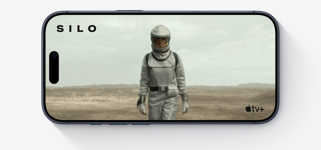 iPhone front exterior, horizontal, screen showing Apple TV+ clip from The Morning Show