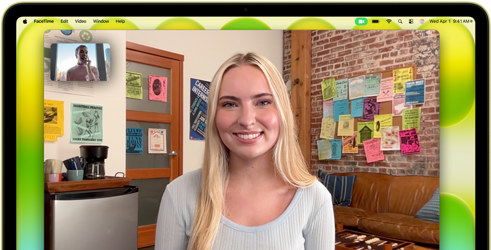 MacBook Neo, citrus color, camera located above display, FaceTime video call onscreen