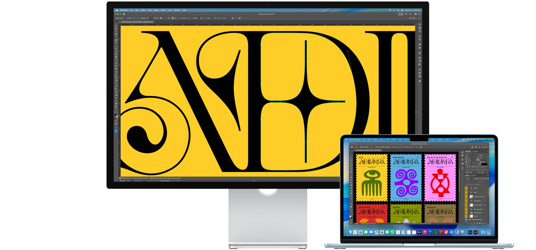 Studio Display and a Mac laptop showing a project being worked on in multiple Adobe programs, Studio Display shows a close-up on black text against a rich yellow background, the anti-reflective coating helps reduce glare